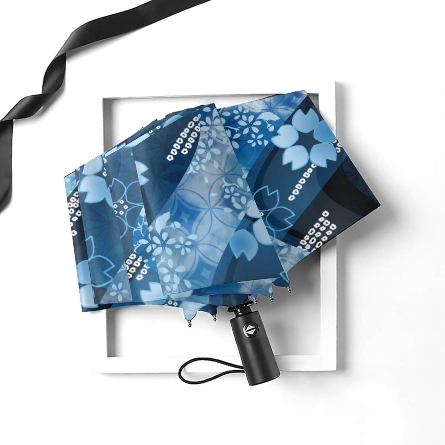 Parapluie pliable à motif floral bleu
