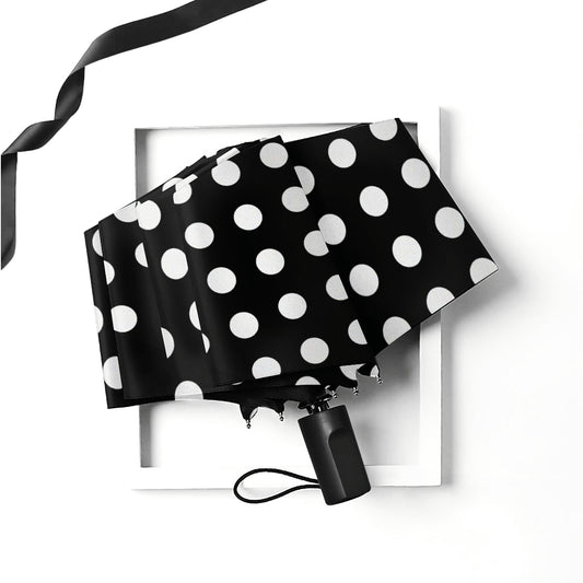 Schwarz-weißer, gepunkteter manueller Taschenschirm