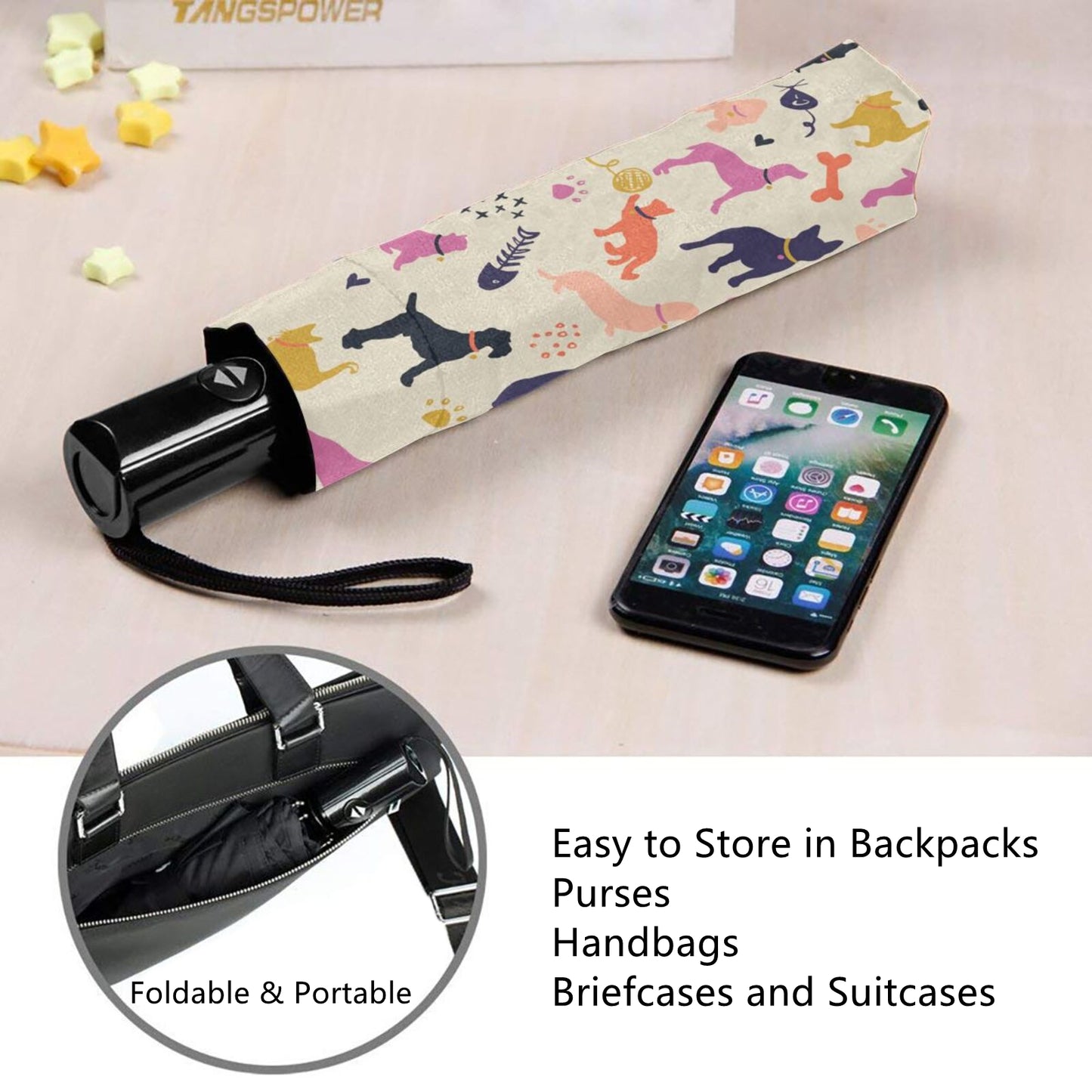 Kompakter Regenschirm mit Hunde- und Katzenmotiv im Inneren