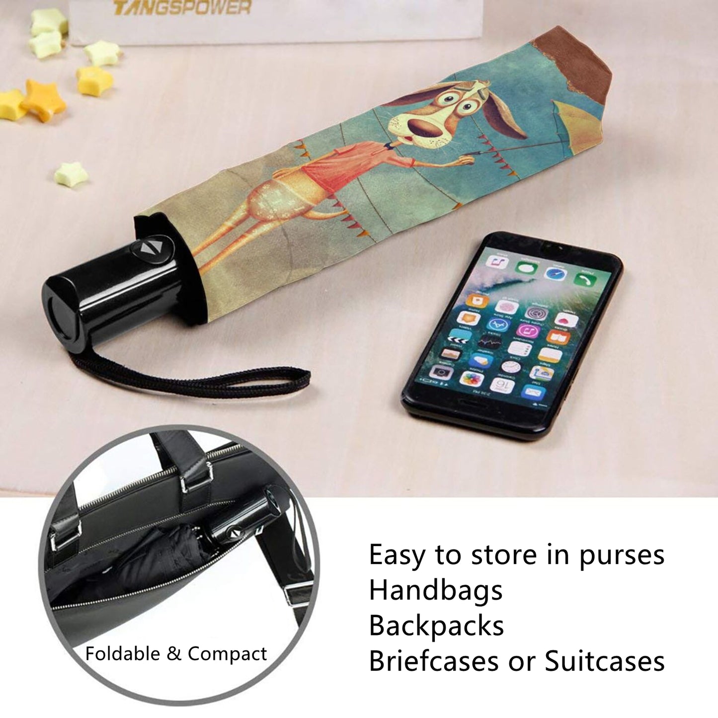 Kleiner faltbarer Regenschirm mit lustigem Design im Inneren