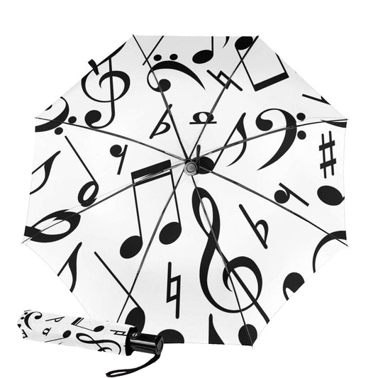 Kleiner kompakter Regenschirm mit Musiknote im Inneren