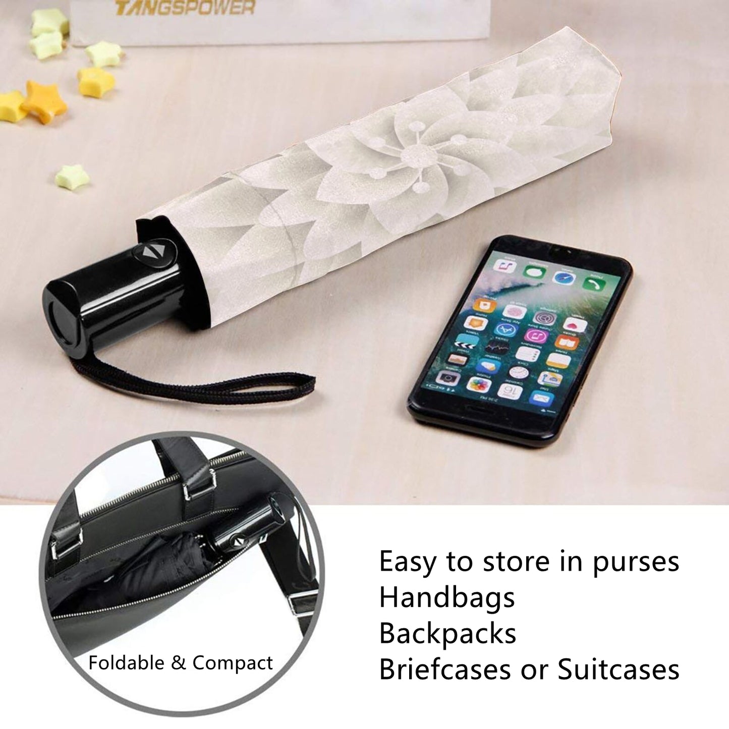 Kleiner faltbarer Regenschirm mit weißem Blumenmuster innen