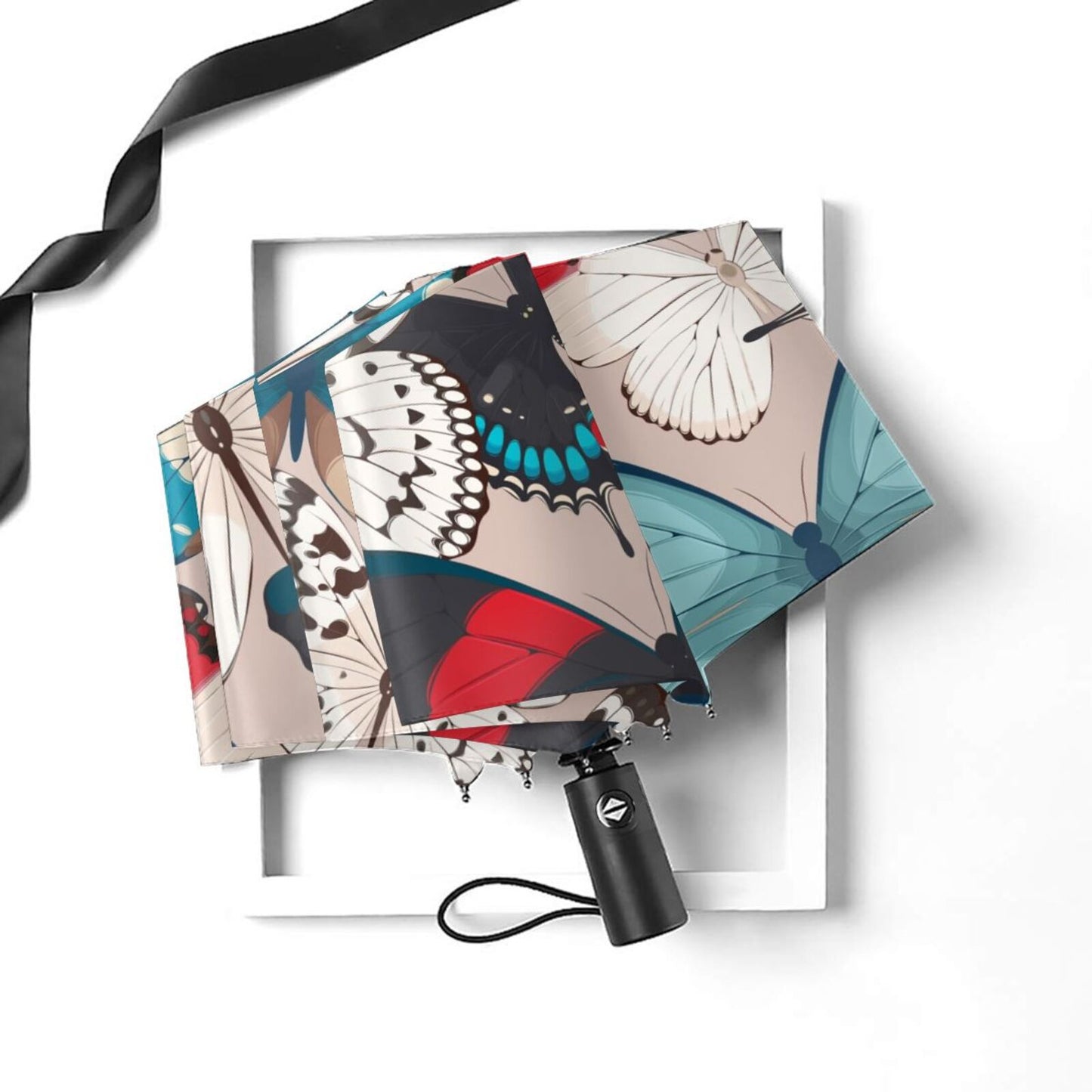 Petit parapluie compact à papillons colorés