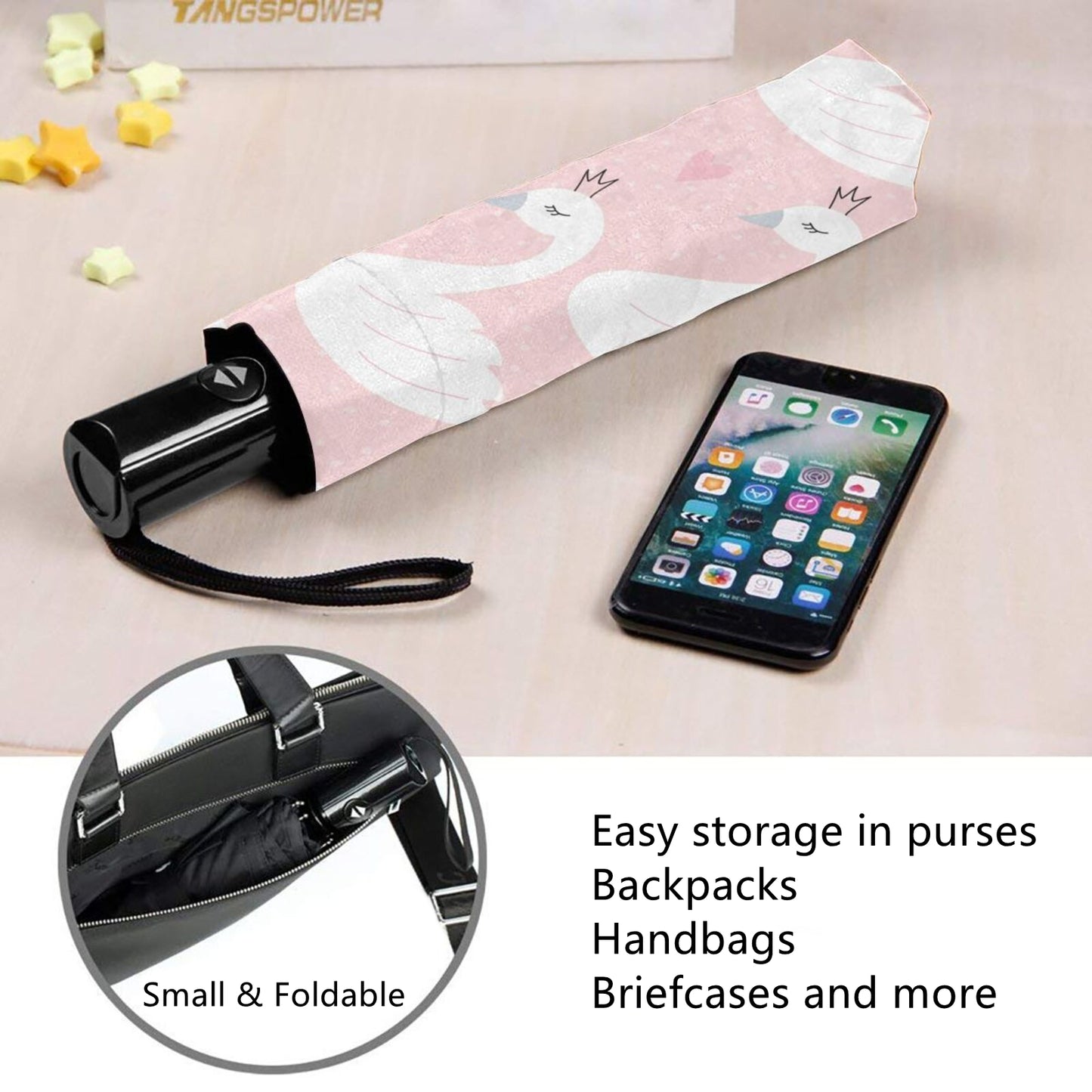 Kleiner, kompakter Regenschirm mit weißem Schwanen-Print auf der Innenseite