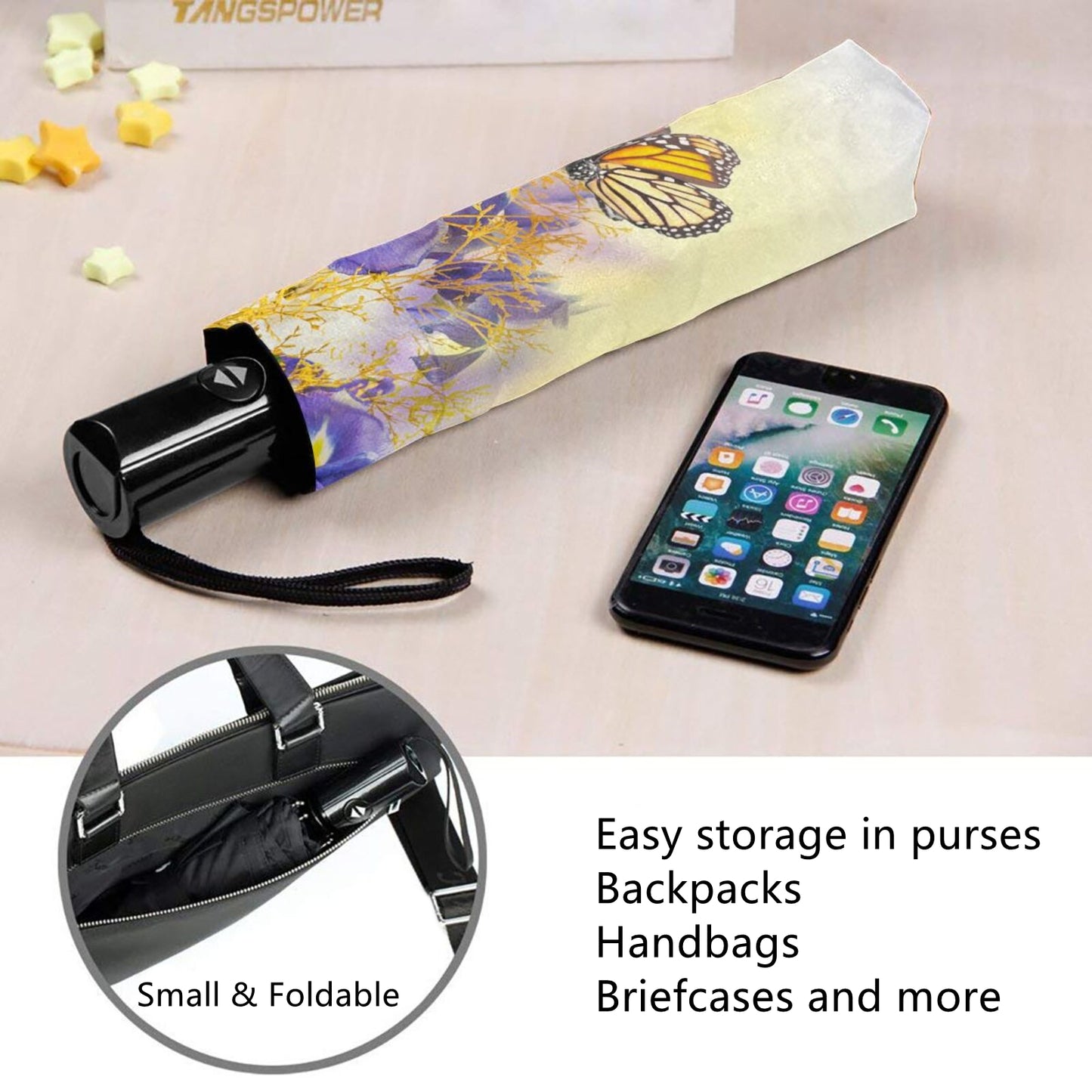 Kleiner Reiseschirm mit buntem Schmetterling im Inneren