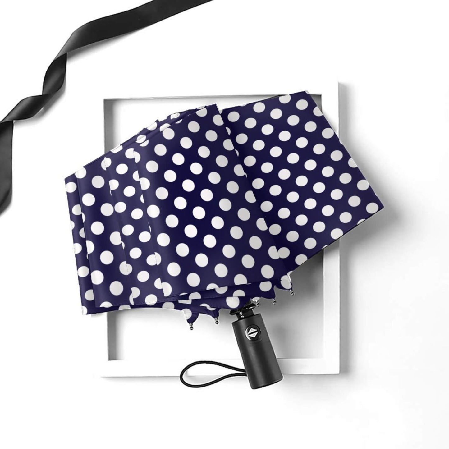 Parapluie compact bleu marine à pois blancs