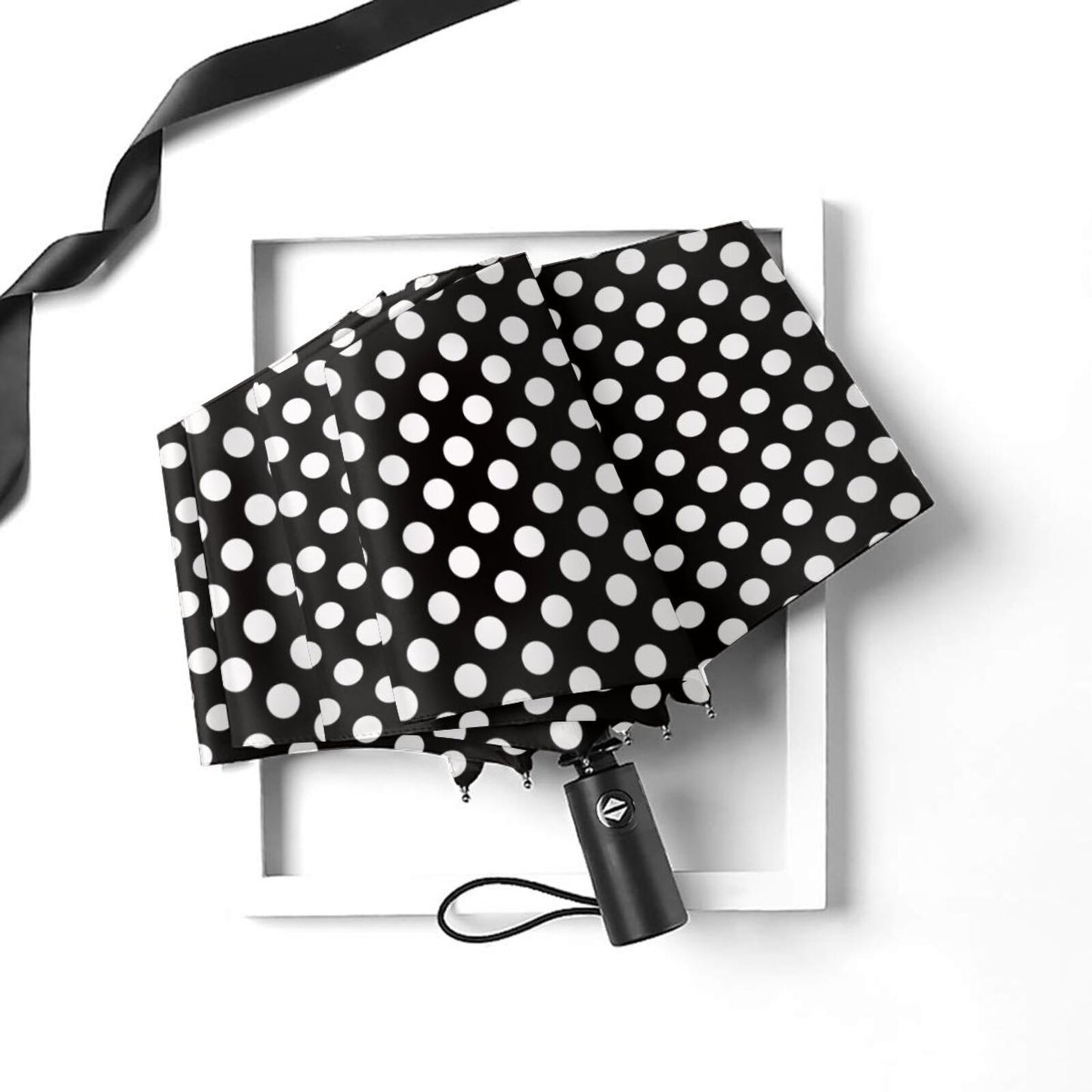 Parapluie pliable à pois noirs et blancs