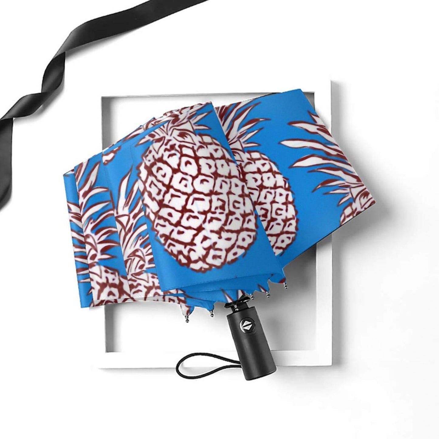 Parapluie de voyage pliable au design ananas