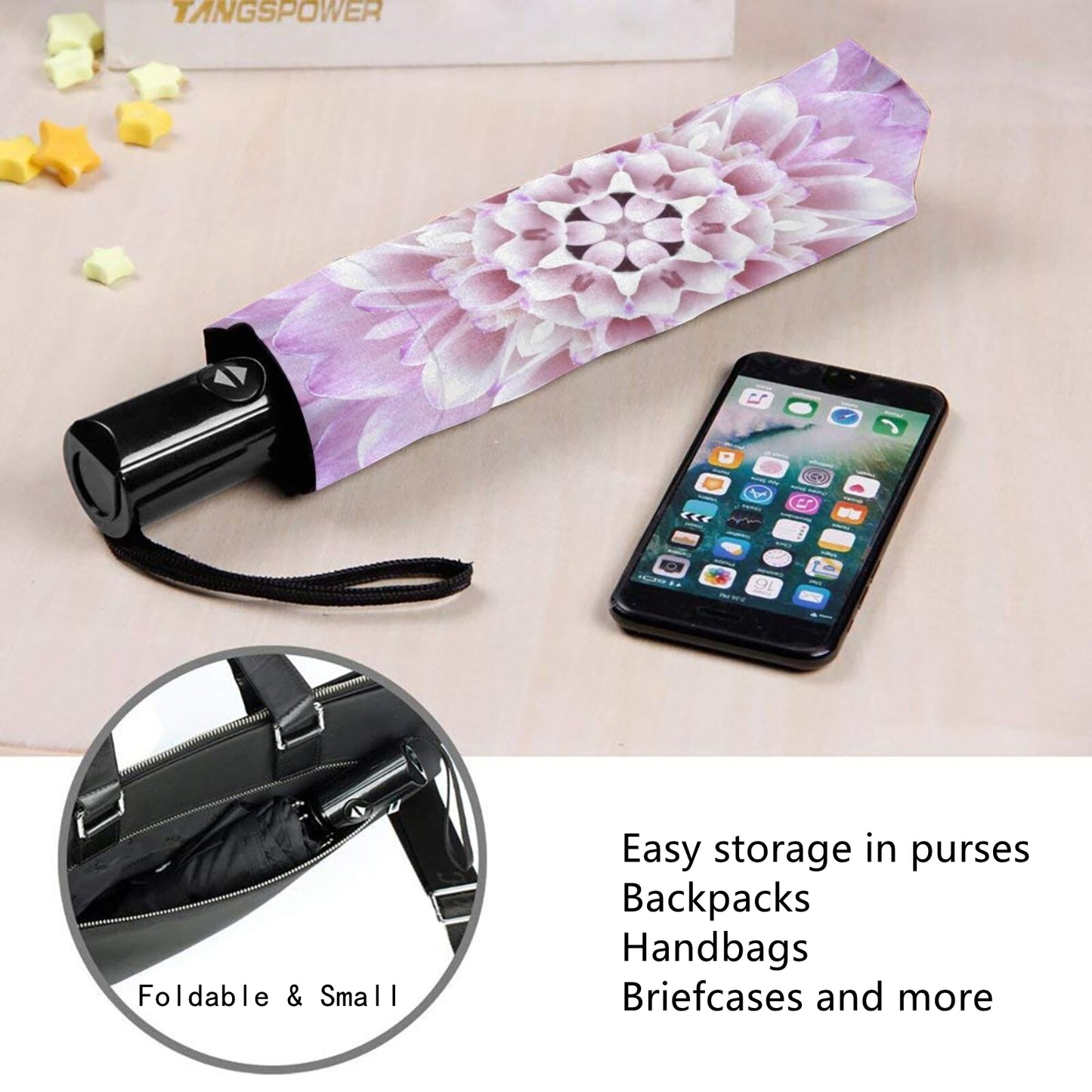 Kleiner Taschenschirm mit lila Blume im Inneren