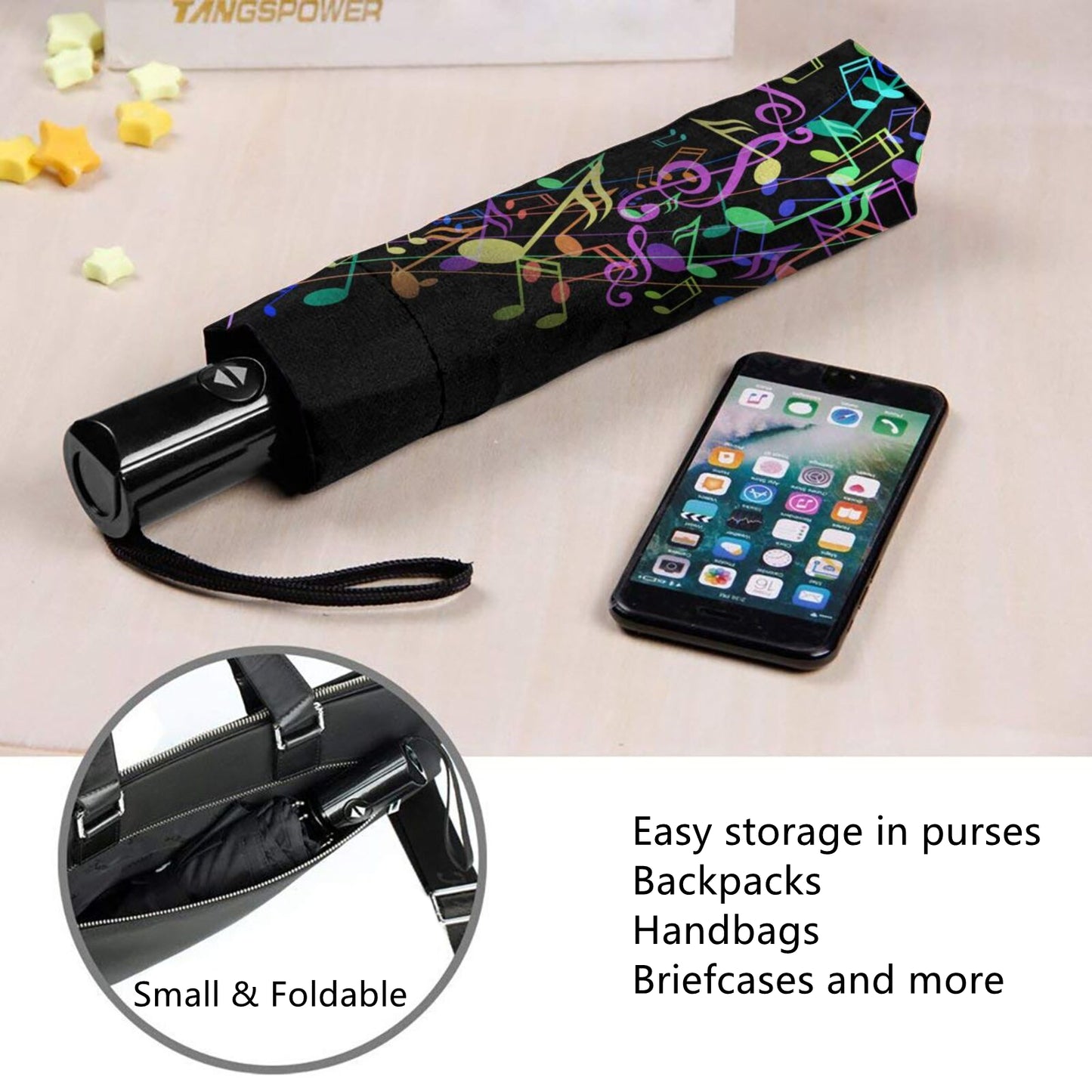 Kleiner faltbarer Regenschirm mit Musiknoten-Design im Inneren