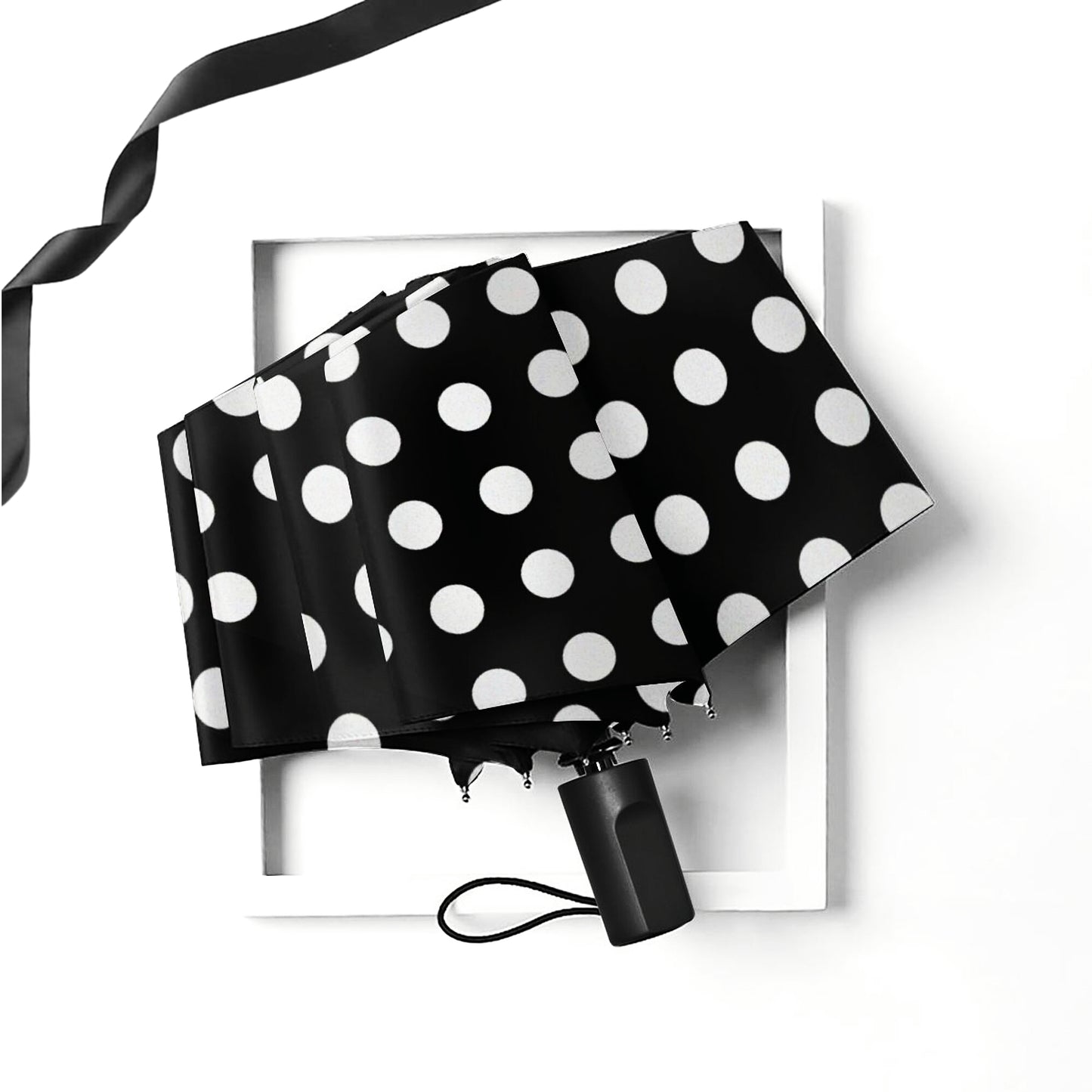Parapluie pliant manuel à pois noirs et blancs