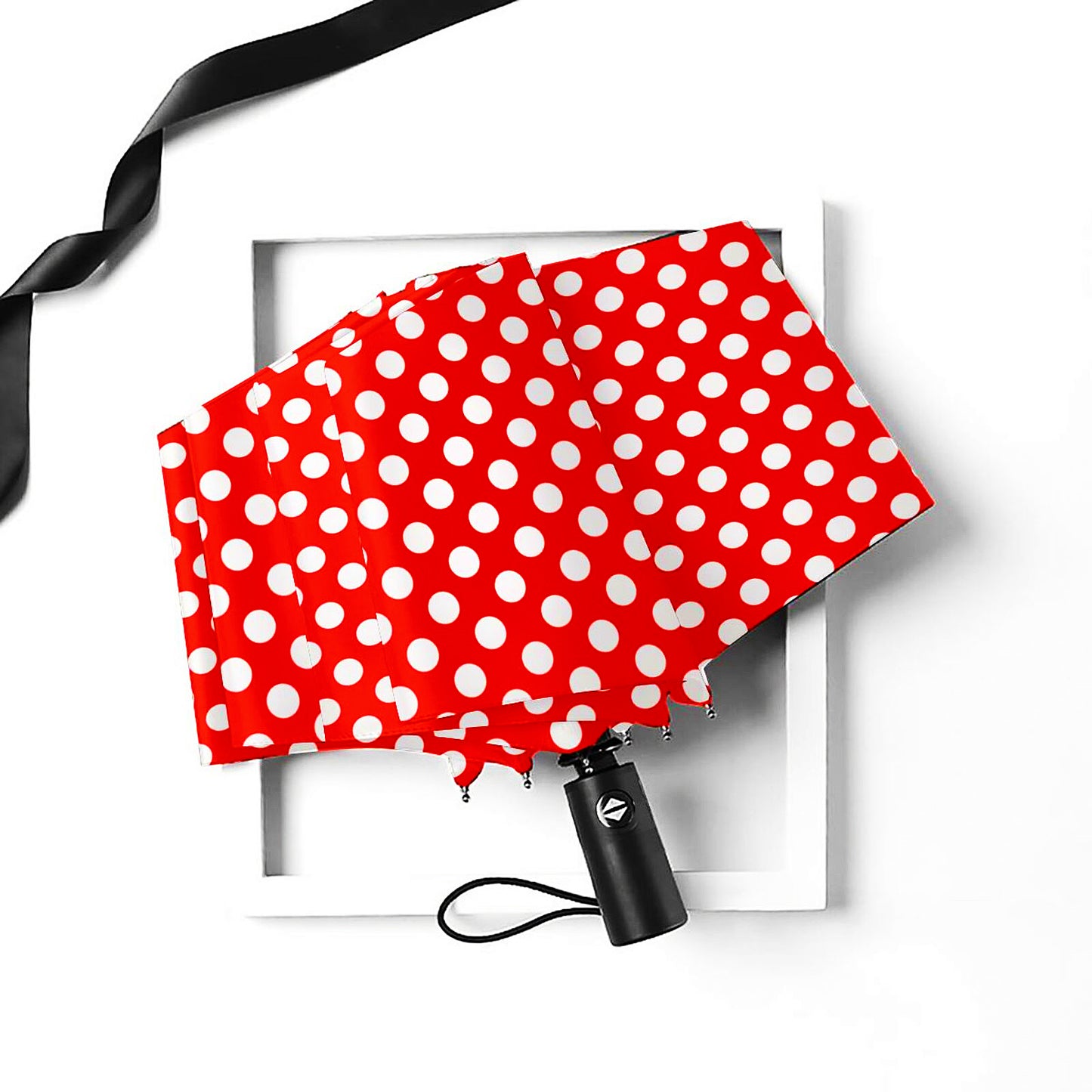 Parapluie pliable à pois rouges et blancs