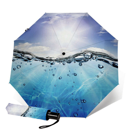 Parapluie compact soleil et gouttes d'eau